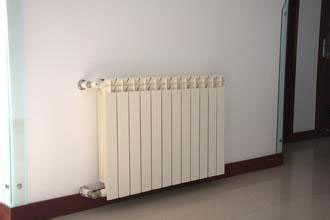 關于壁掛爐與暖氣、地暖三者的特點分析